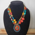 Multi-Strand Beaded Necklace w/ an Antiqued Gold-Tone Pendant