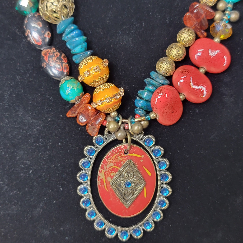 Multi-Strand Beaded Necklace w/ an Antiqued Gold-Tone Pendant