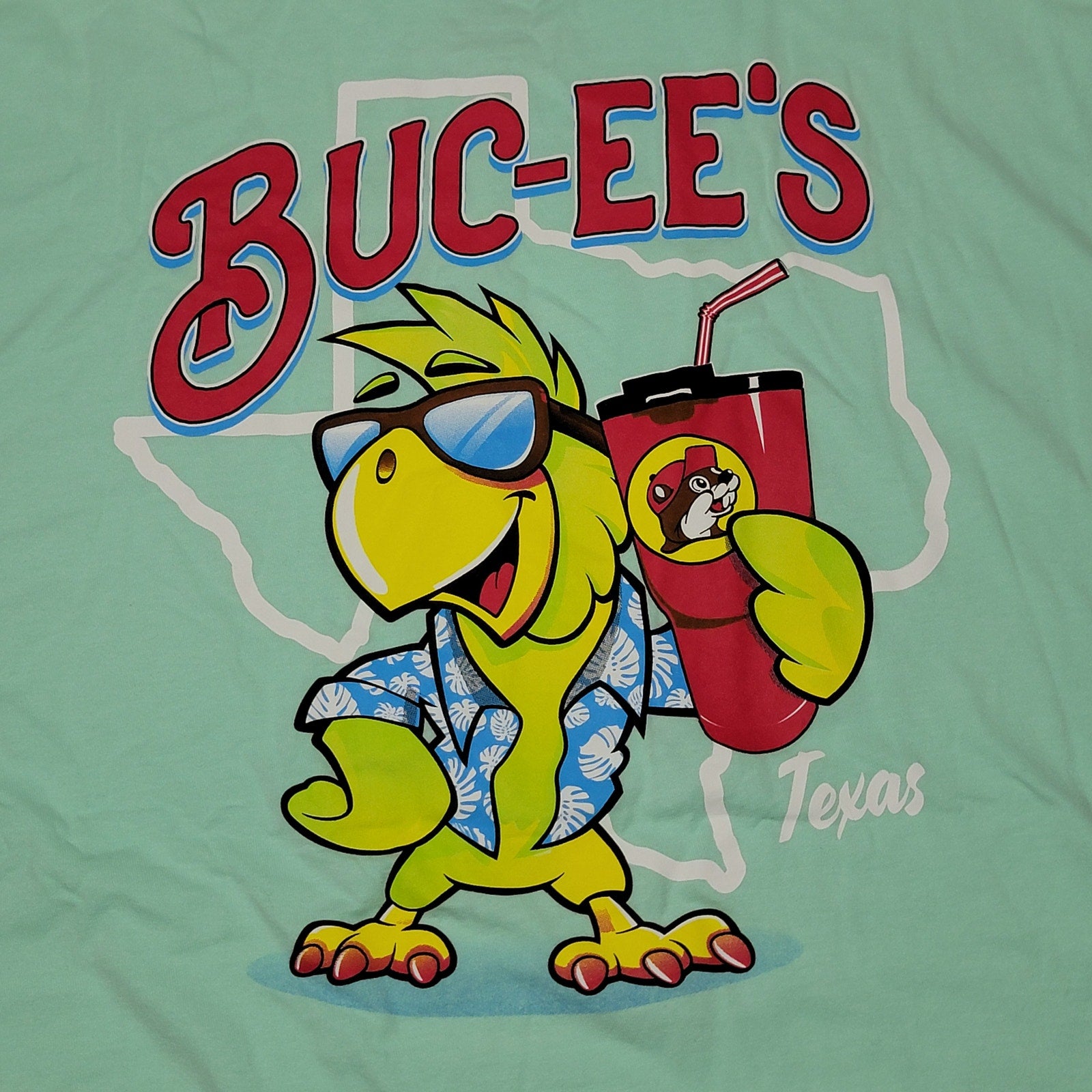 Buc-ee's Teal Tee Texas Parrot w/ a Buc-ee's Drink - Size AXL
