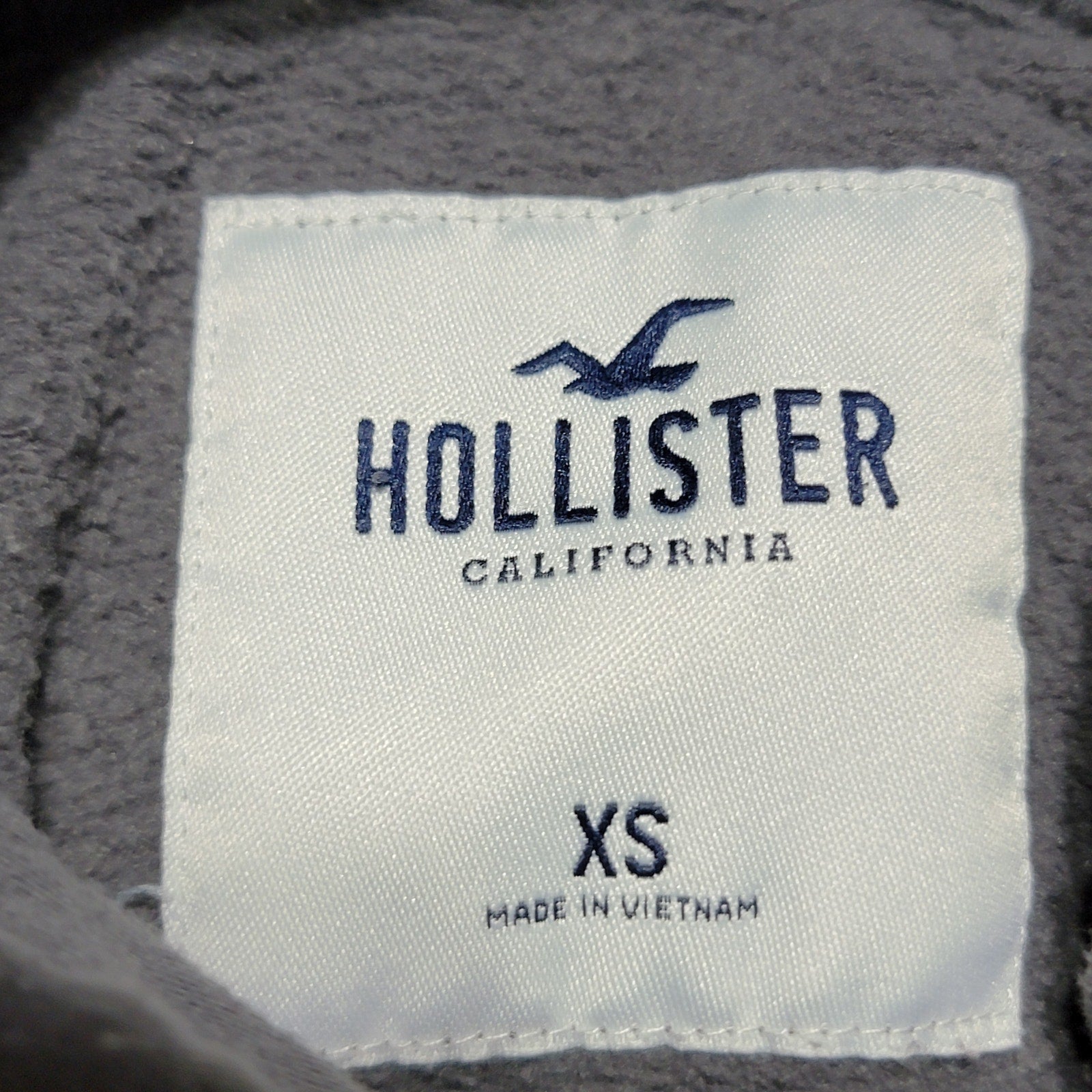 Hollister LS Dark Grey Crop Hoodie "Mystic Soul World Tour" - Size XS