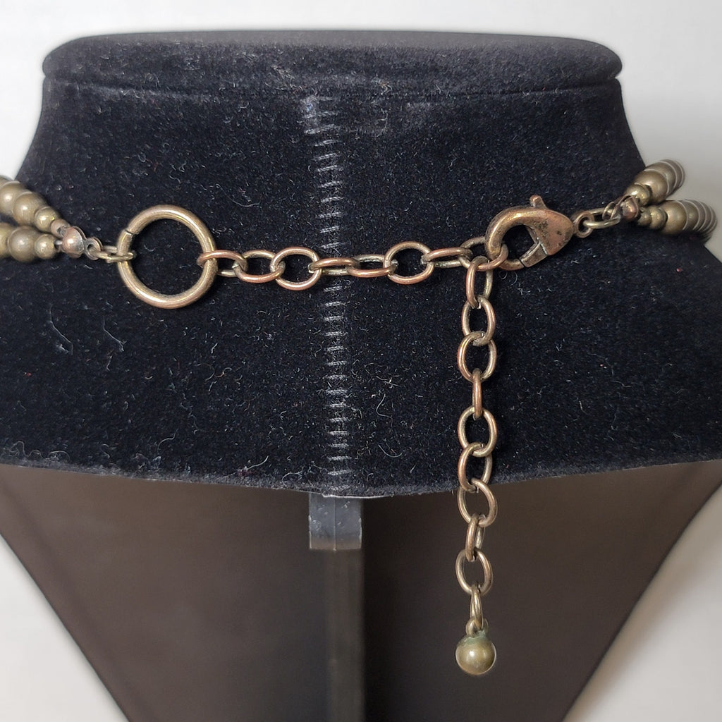 Multi-Strand Beaded Necklace w/ an Antiqued Gold-Tone Pendant
