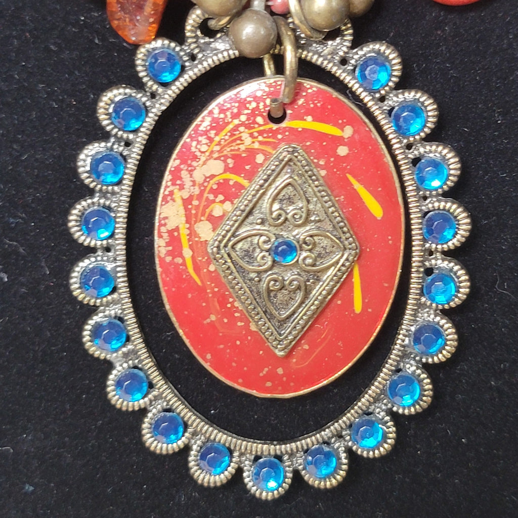Multi-Strand Beaded Necklace w/ an Antiqued Gold-Tone Pendant