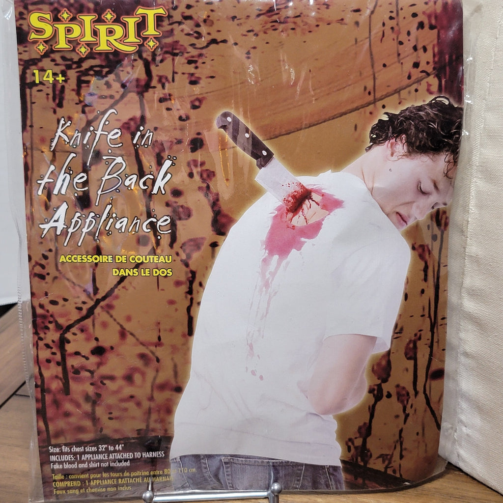 Spirit Halloween Knife In The Back Appliance - Chest Size 32" to 44" - NEW