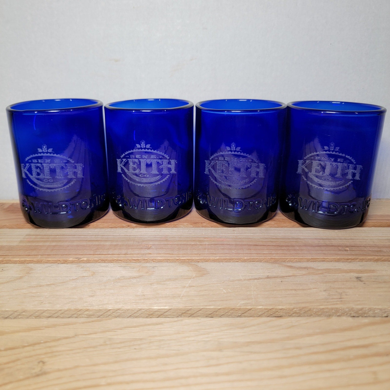 Set of 4 Cobalt Blue "Wild Tonic" Glasses w/ Ben E. Keith Co Etched